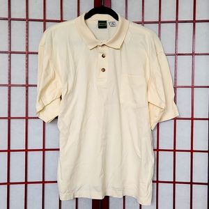 Club Fellow Light yellow short-sleeved polo with left front pocket. Men's size M
